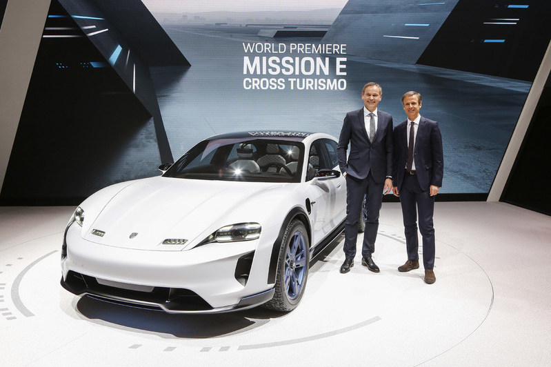 Geneva International Motor Show 2018: Oliver Blume, Chairman of the Executive Board of Porsche AG and Michael Mauer, Vice President Style Porsche, presenting the concept study Mission E Cross Turismo