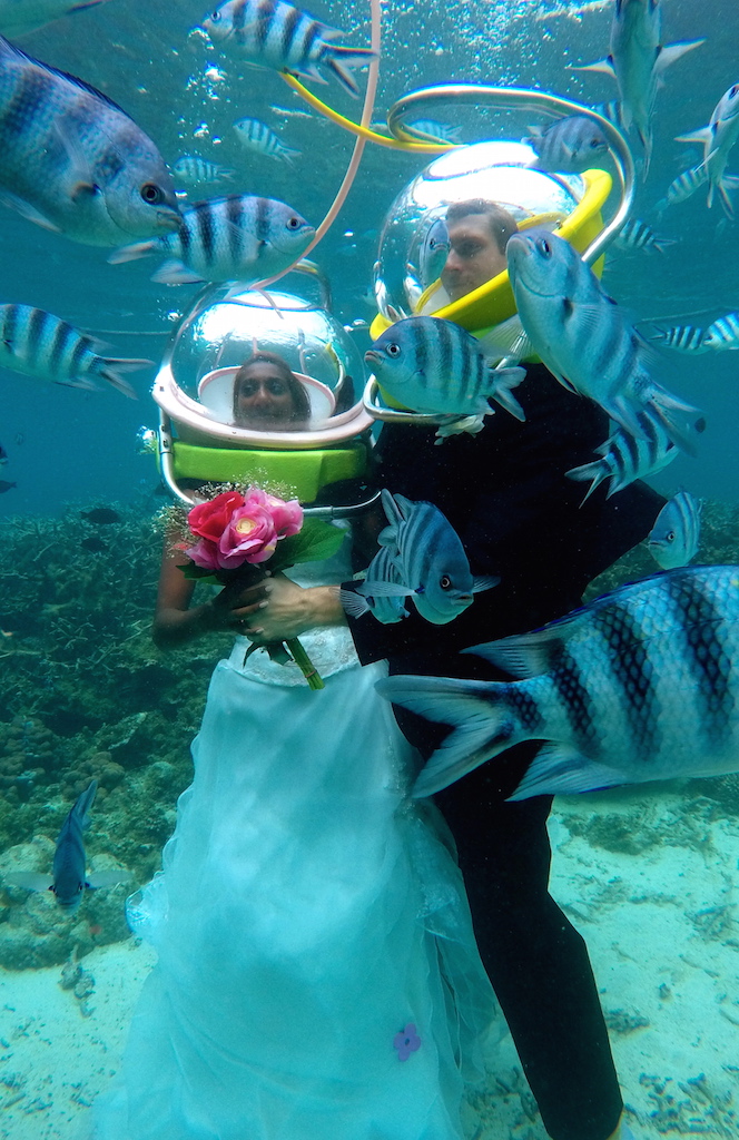 Newly Wedded Couples under the Water